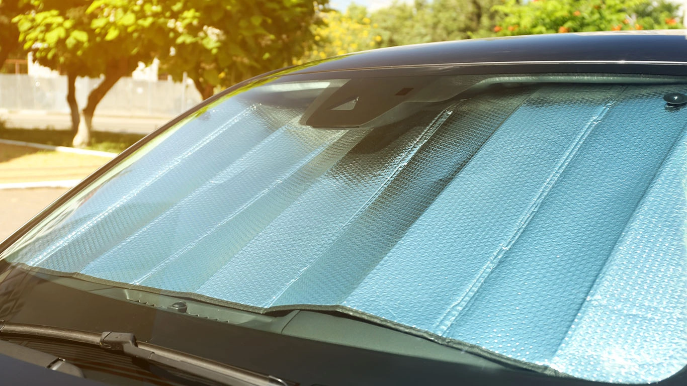 Sun shade windshield inside car closeup heat protection scaled 1366